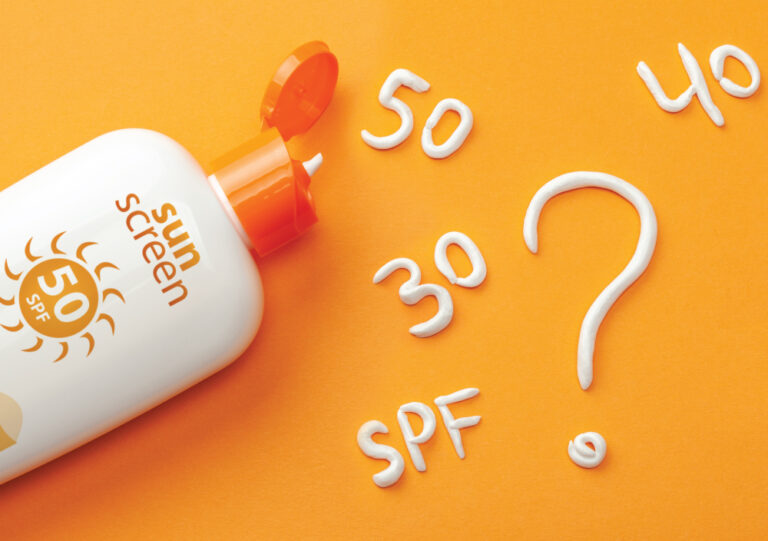 Image of sunscreen bottle with question marks around the SPF number 50? 30?